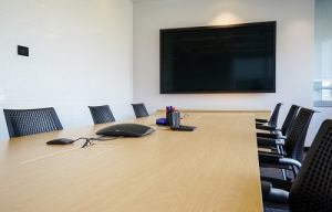 Board room with flat screen TV mounted on the wall